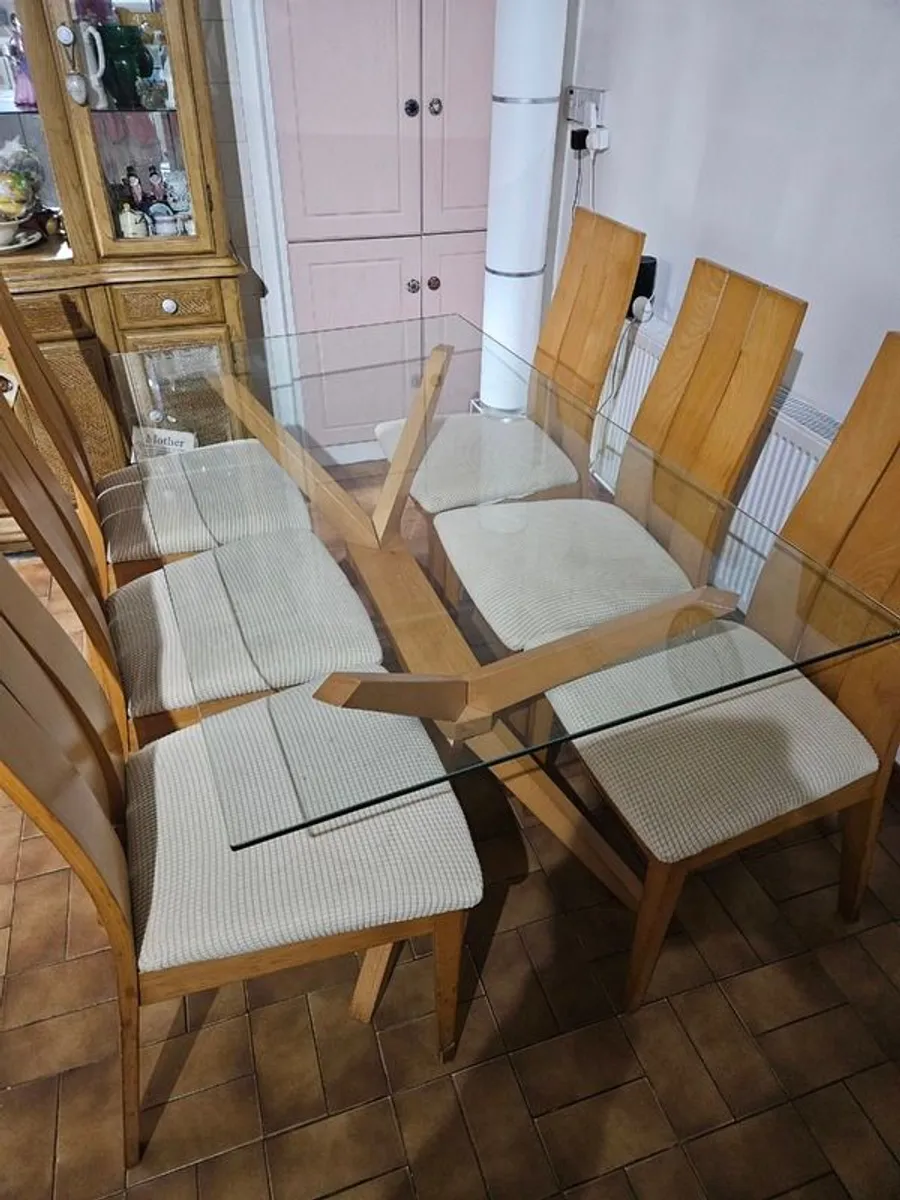 Glass top table and 6 chairs - Image 1
