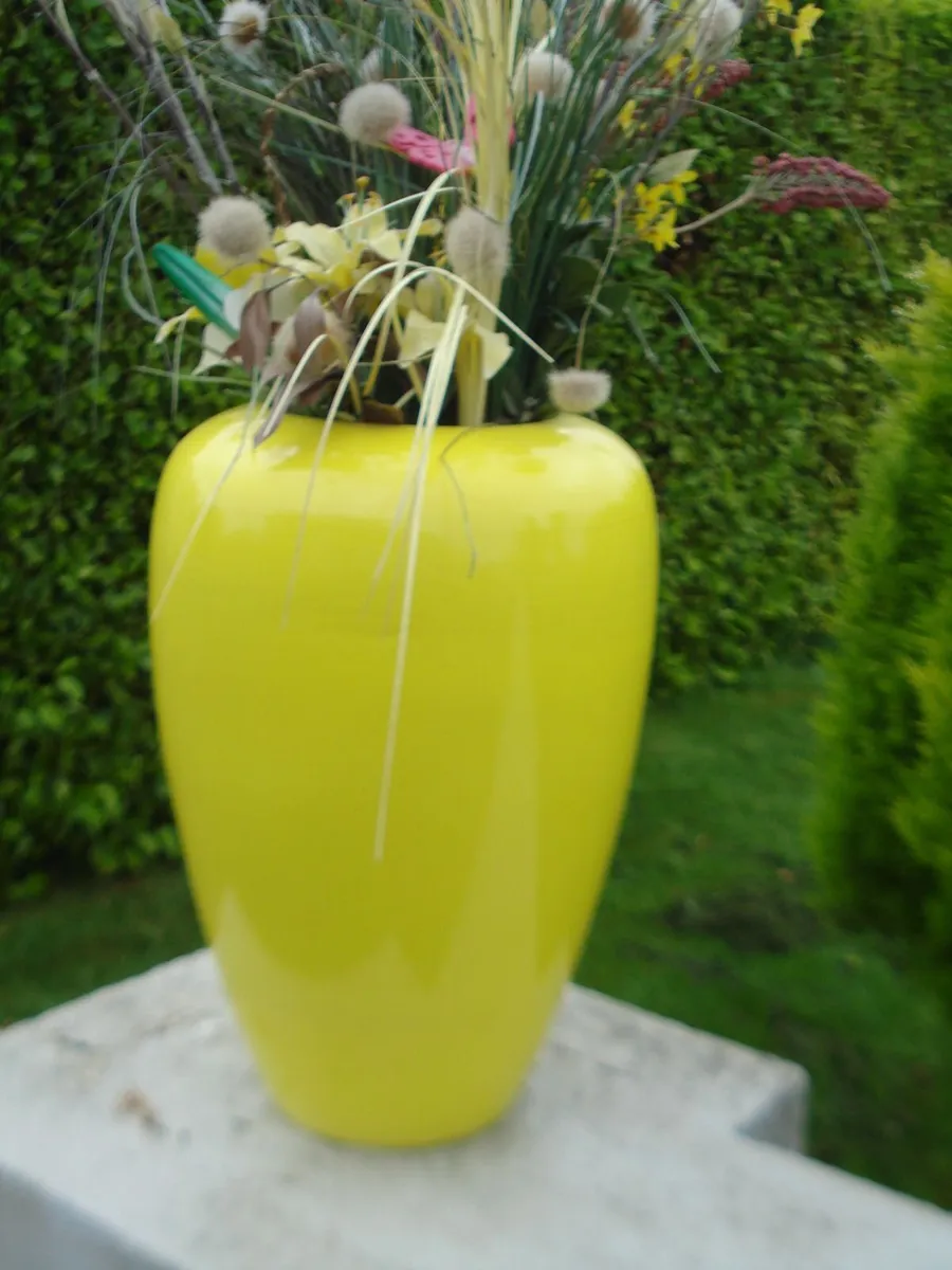 LARGE YELLOW GLAZED VASE WITH ARTIFICIAL FLOWERS. - Image 1