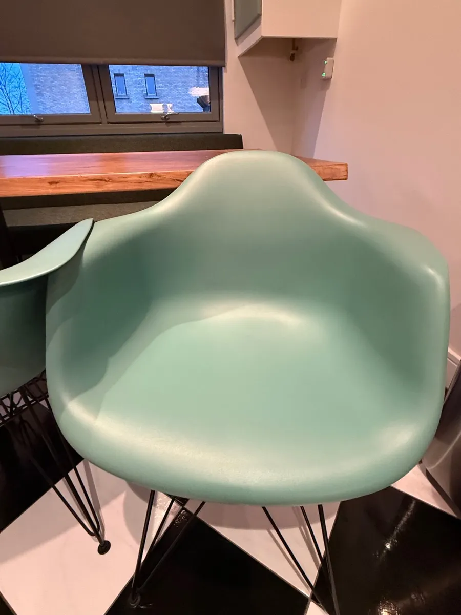 Green plastic and black metal dining chairs - Image 2