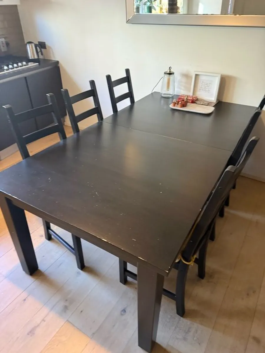 Expandable ikea black table and 6 chairs - Image 3