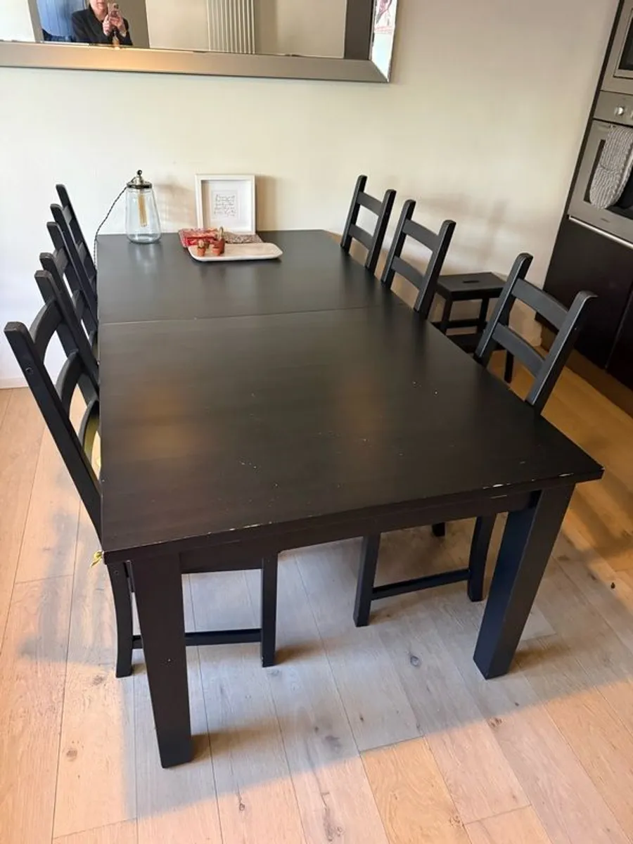 Expandable ikea black table and 6 chairs - Image 1
