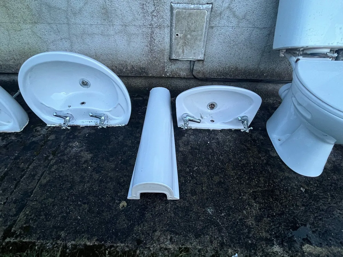 Bathroom hand basins and toilet - Image 4
