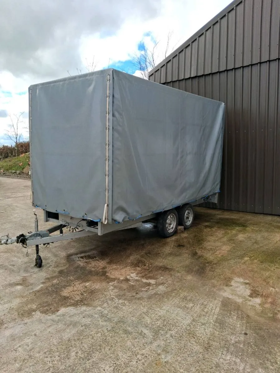Trailer twin axle.  Covered. - Image 1