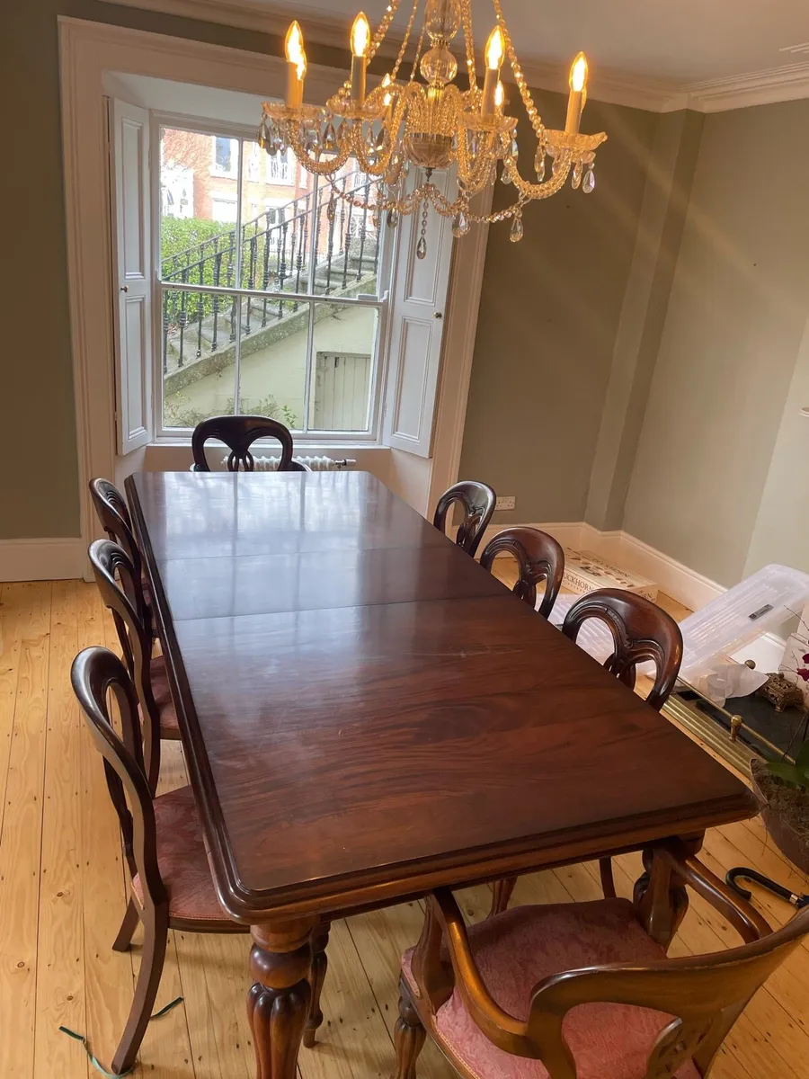 Large extendable wood dining table, 8 chairs - Image 1