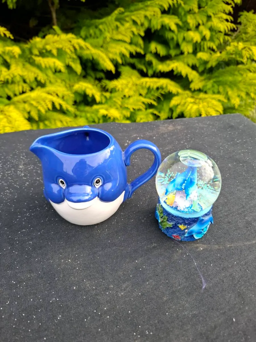 2 dolphin ornaments
