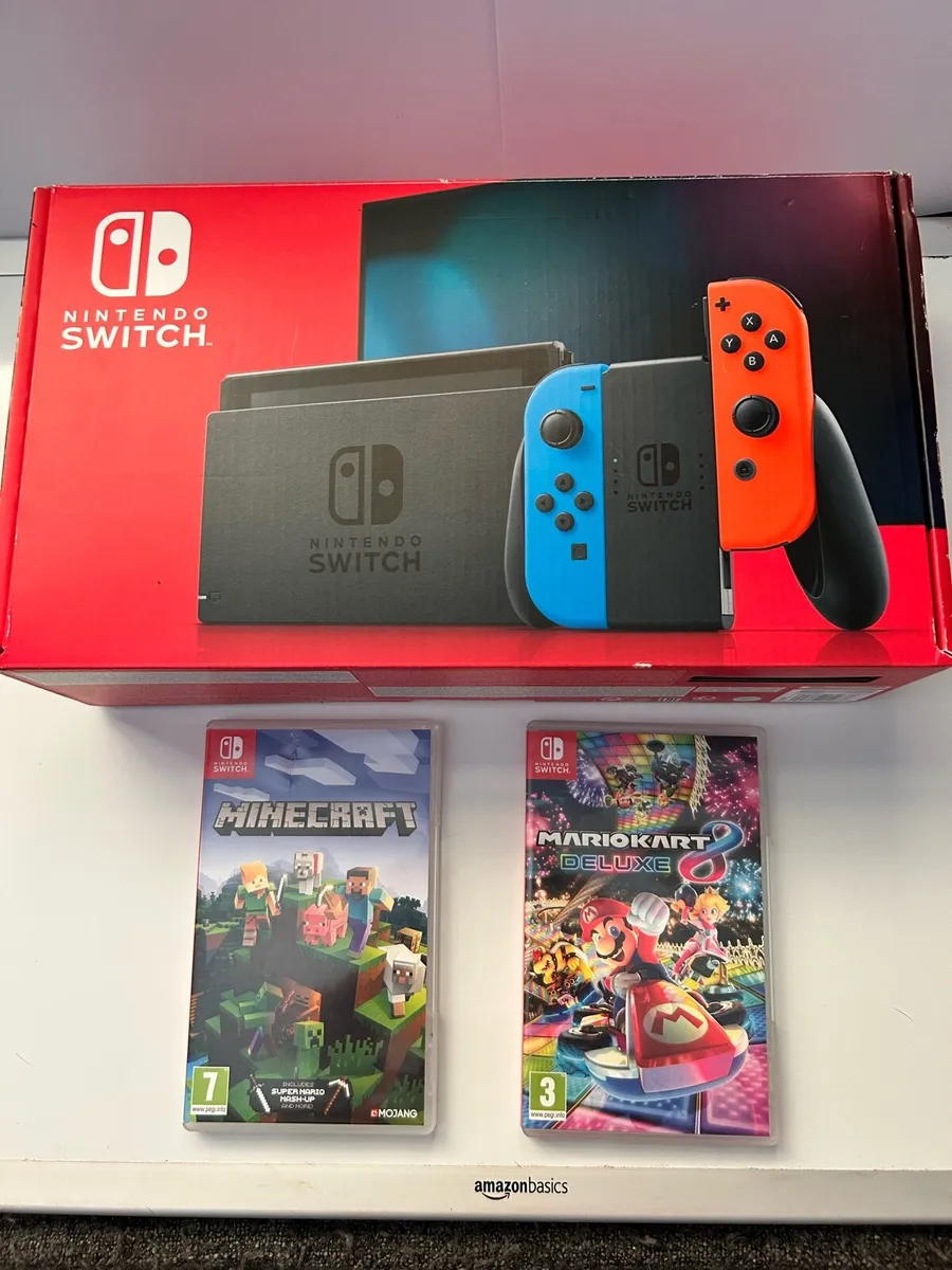 Like new Nintendo switch with Mario cart & minecra - Image 1