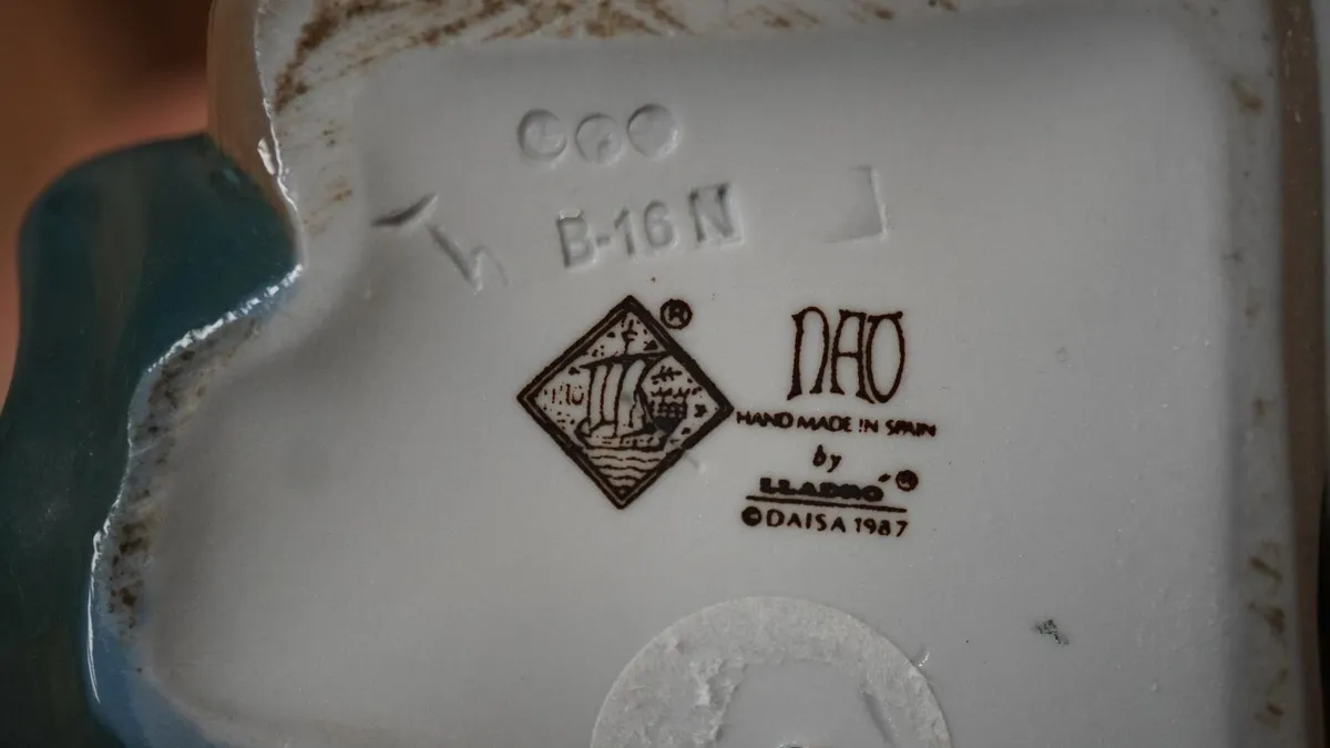 Nao by Lladro Tying His Shoe Porcelain Figurine - Image 2