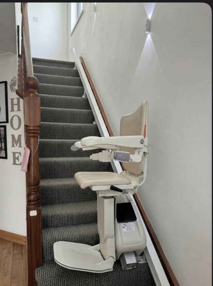 Handicare 1100 stairlift with powered swivel chair - Image 1