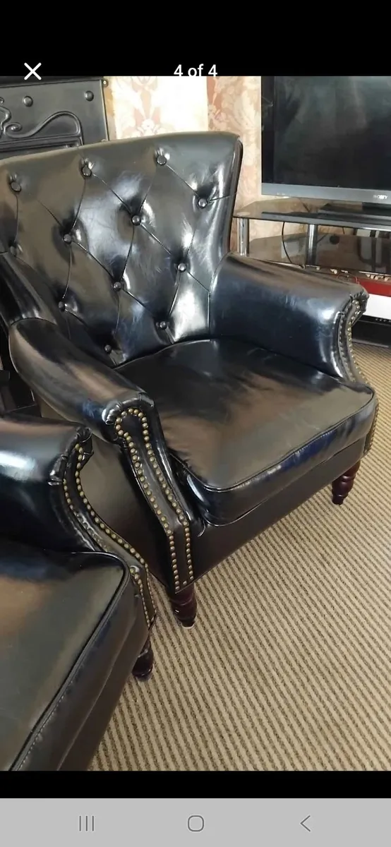 2 x black wingback chairs