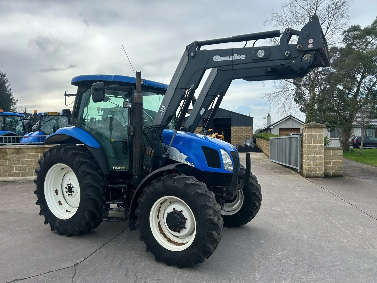 New holland ts110a + loader - Image 1
