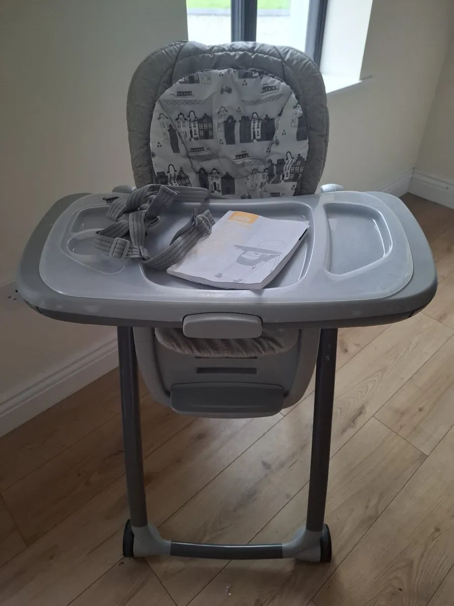 Joie high chair and next to me - Image 1