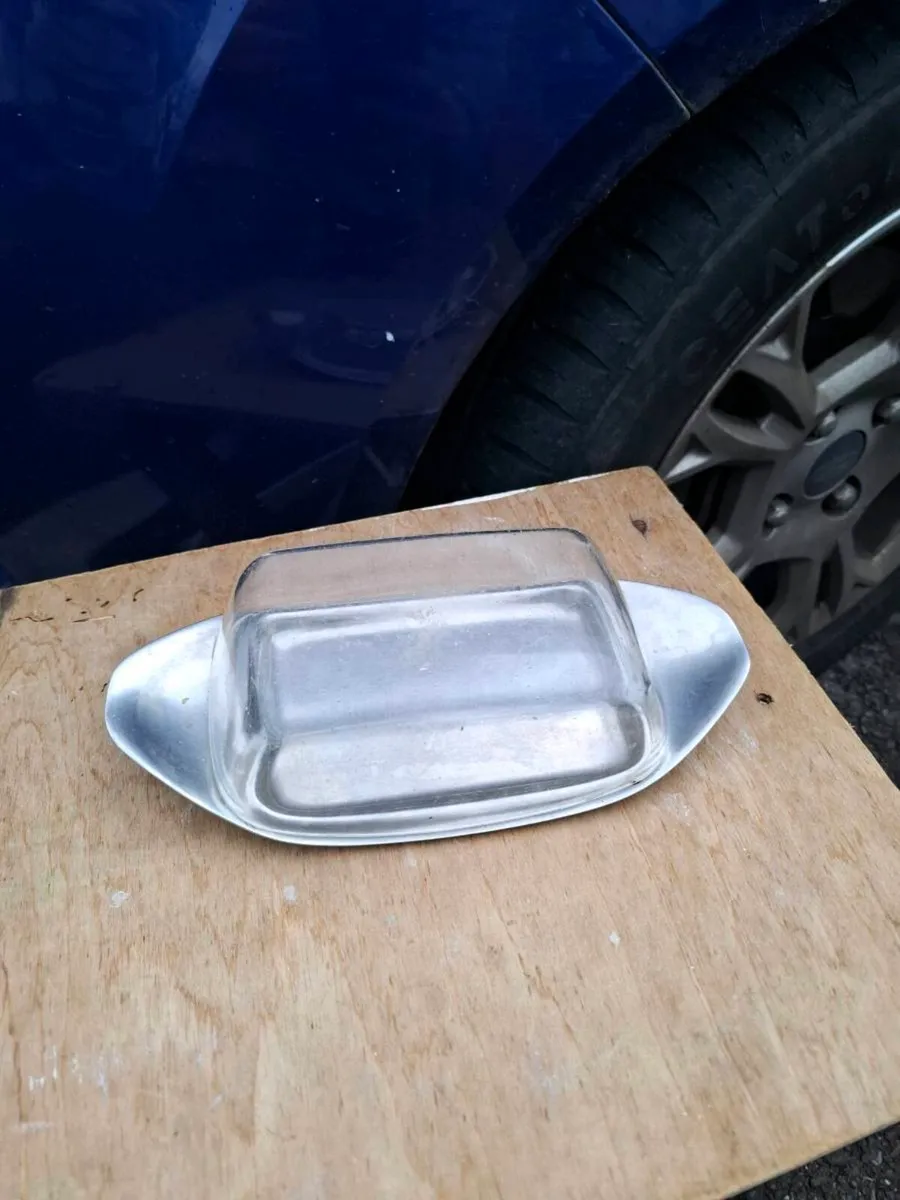 Plastic and metal butter dish