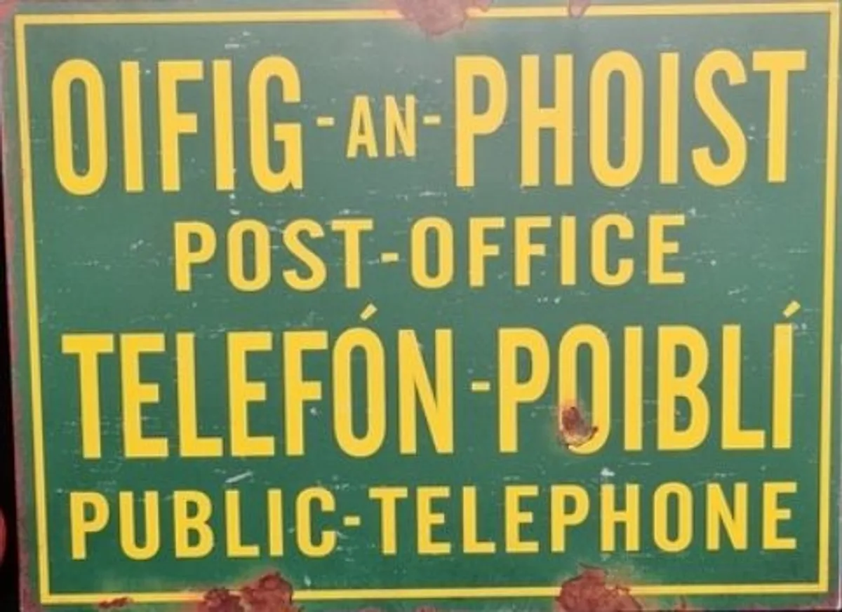 Post Office/Oifig an Phoist Public Telephone/Telefon Poibli sign for sale.