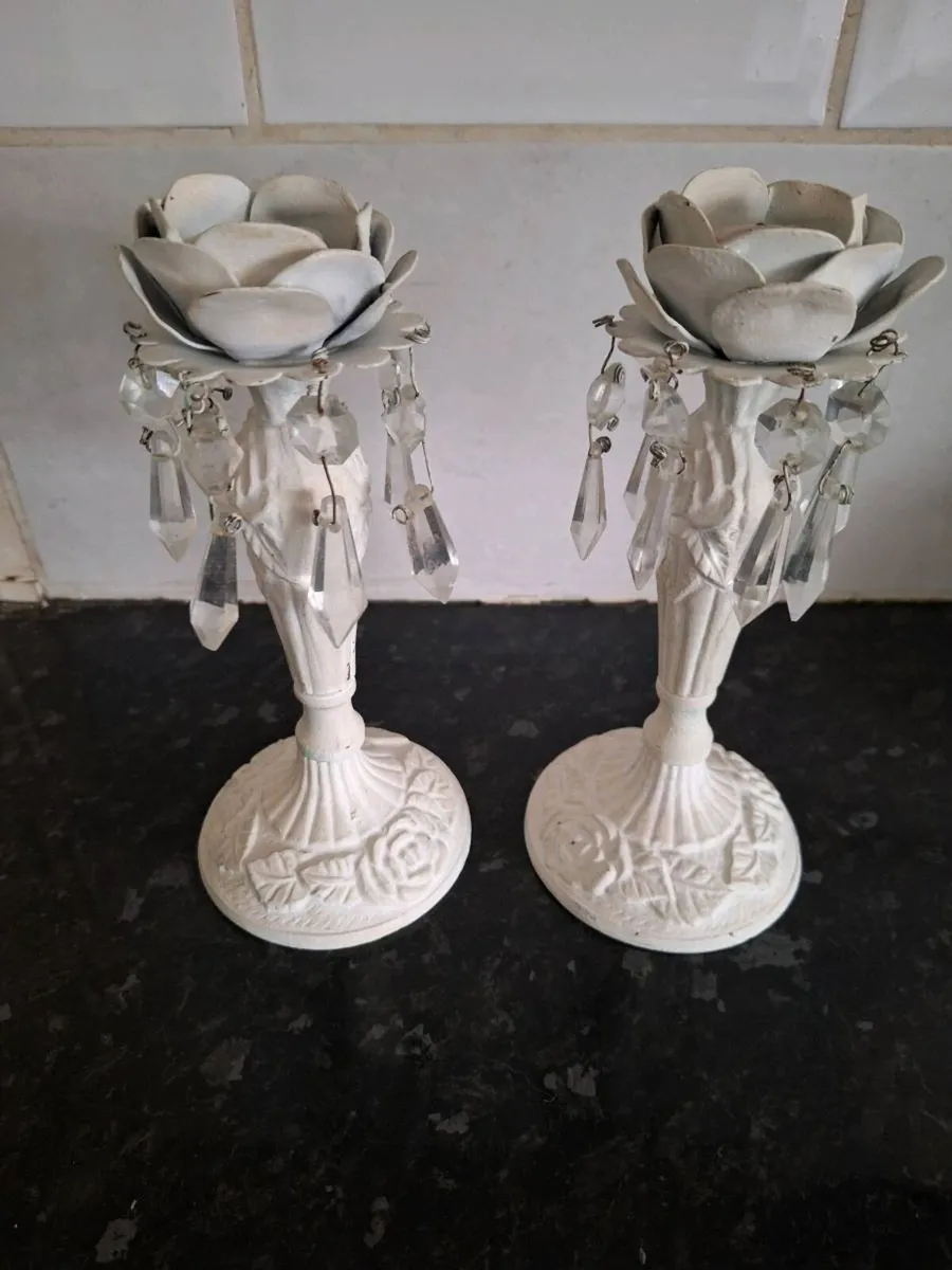 A pair of metal and crystal candleholders - Image 1