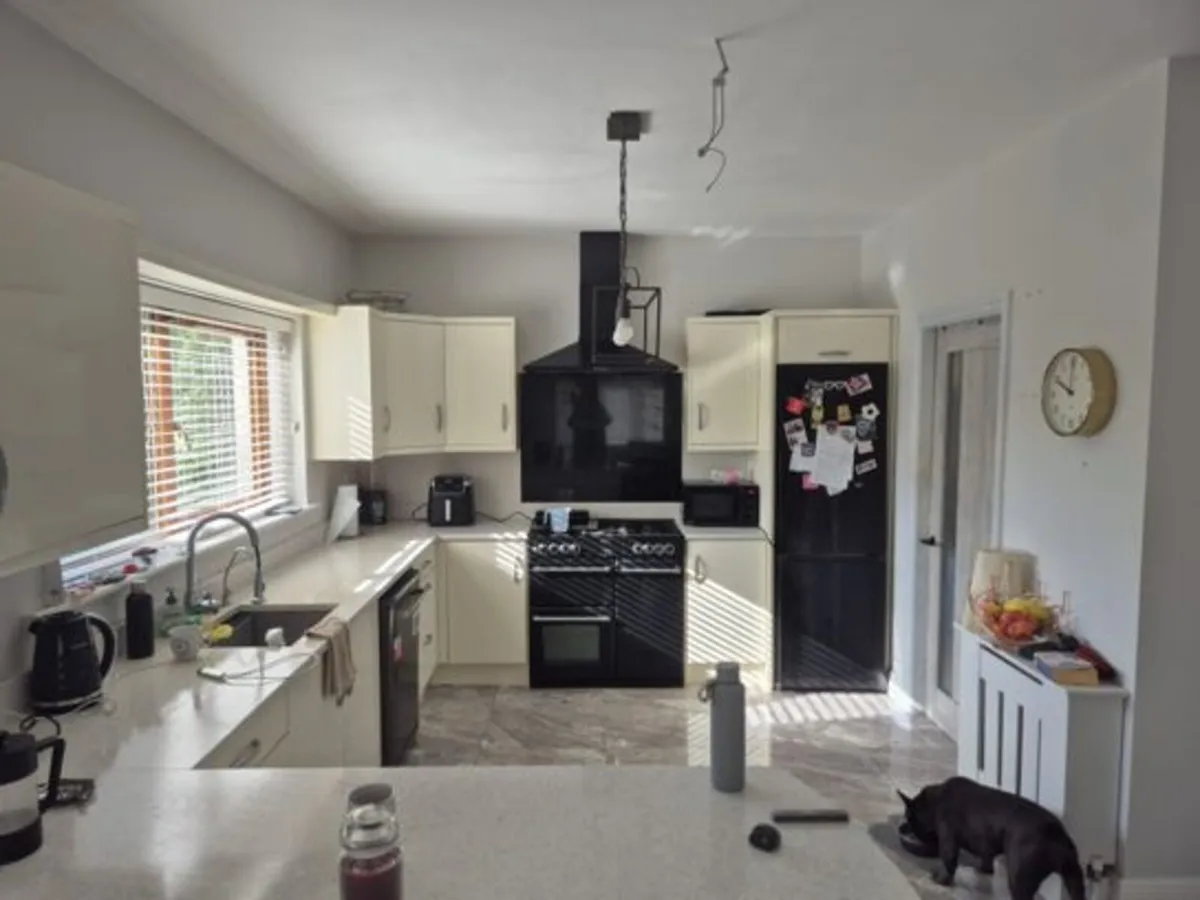 Kitchen with Work Top and Appliances - Image 1