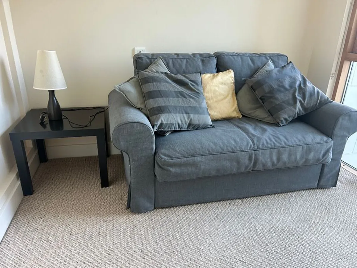 Ikea 2 seater pull-out sofa bed, coffee table & lamp, great condition, for sale - Image 1