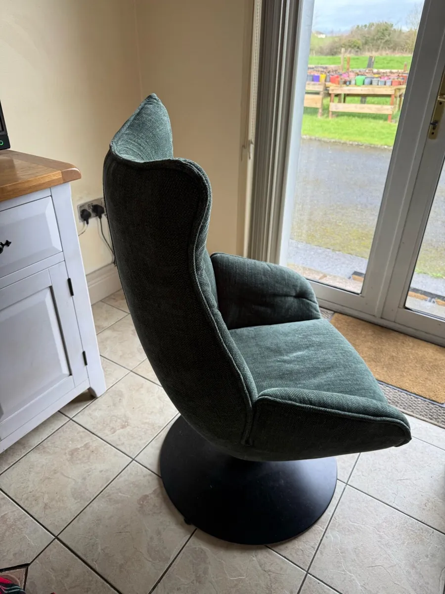 A swivel chair with foot twist - Image 2