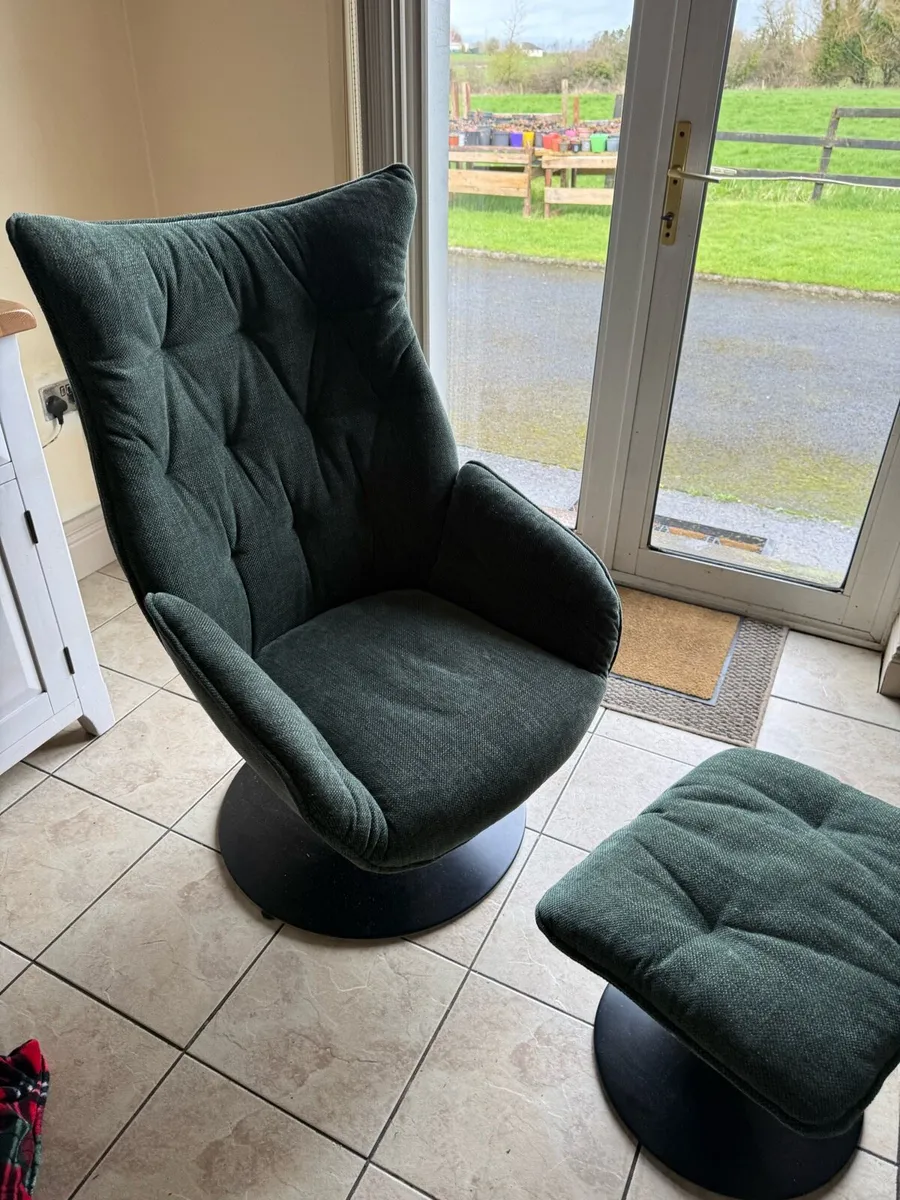 A swivel chair with foot twist - Image 1