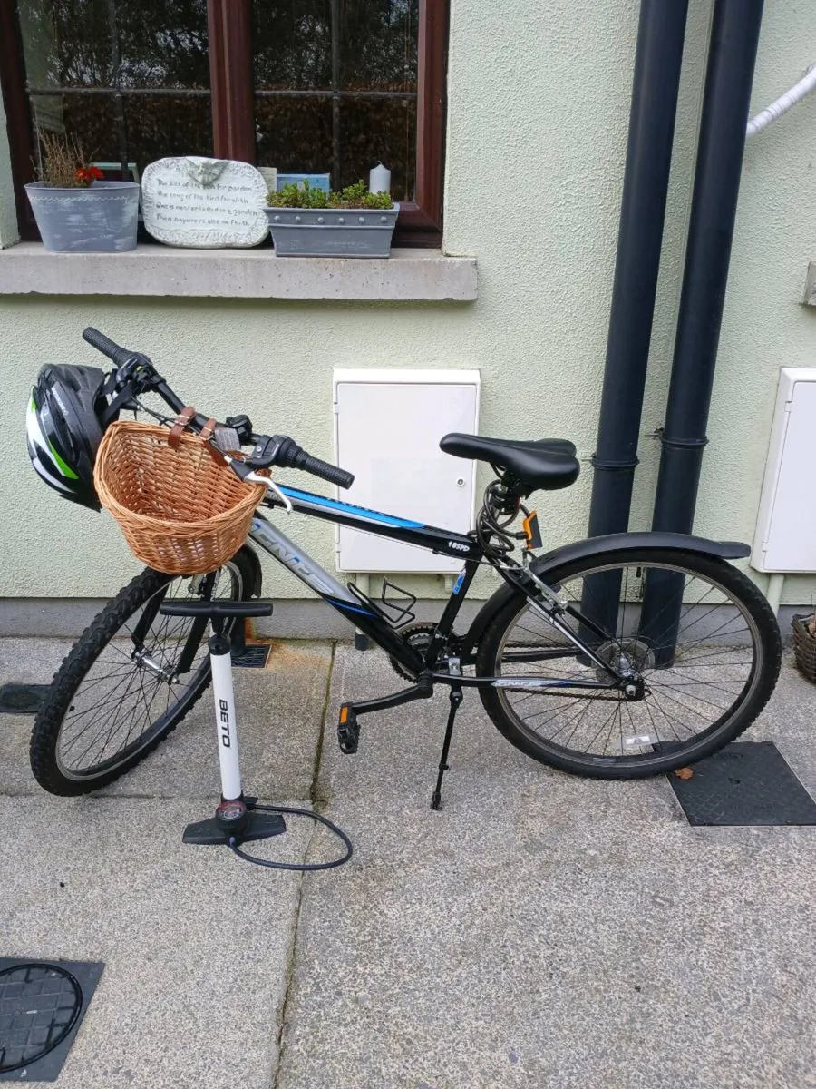Mountain bike complete with helmet and basket . - Image 2
