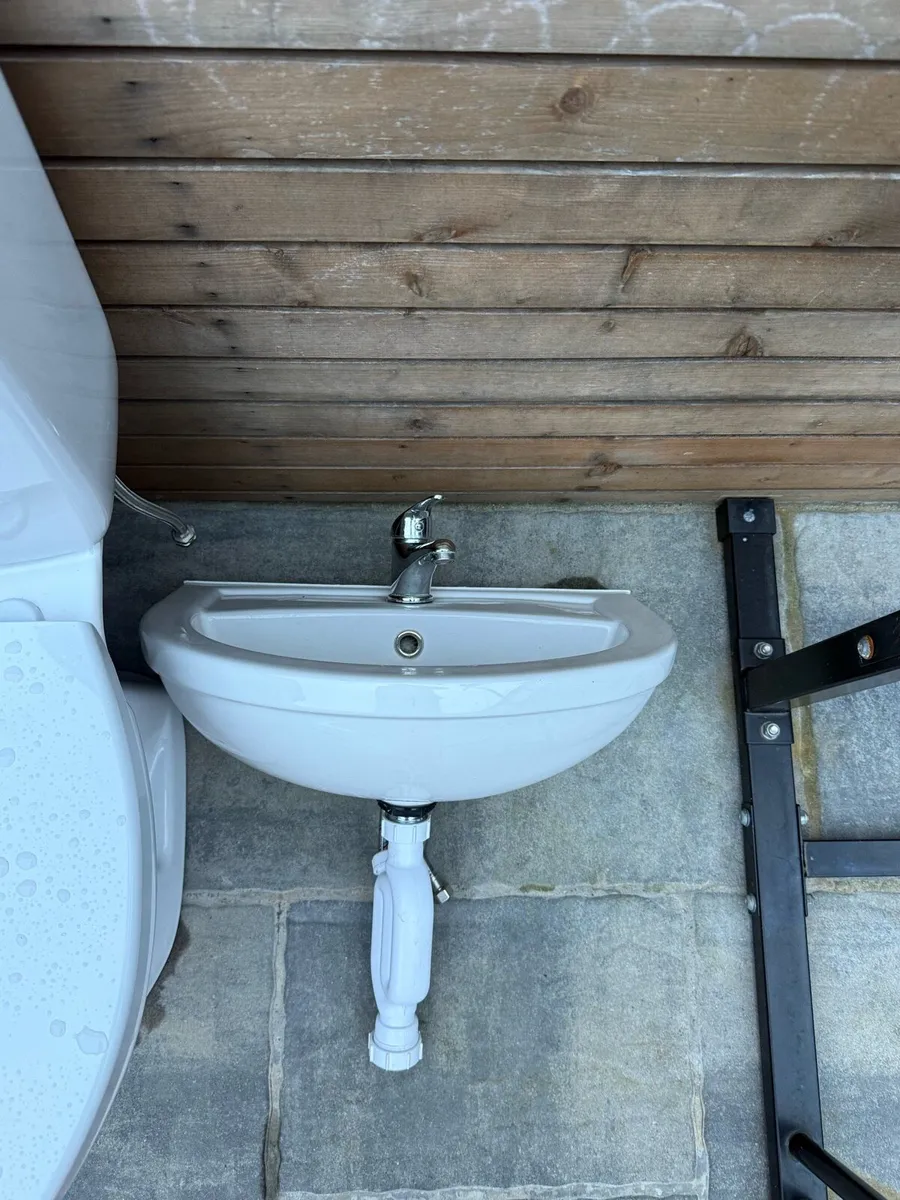 Toilet and a sink - Image 2
