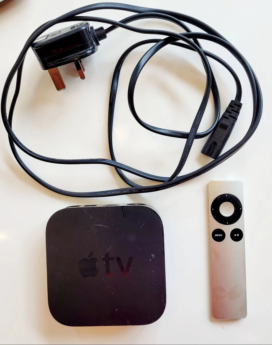 Apple TV box with remote control - Image 1