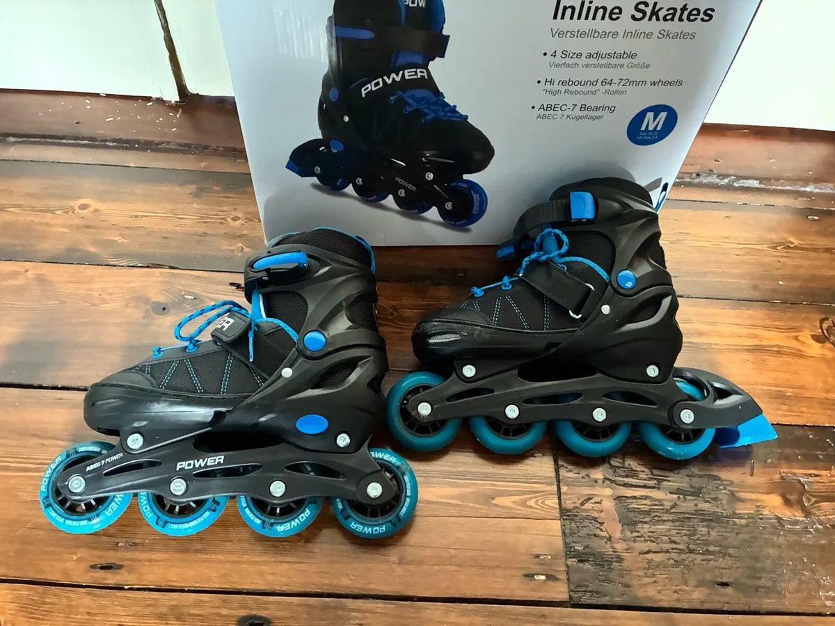 Rollerblades - adjustable size 2-4