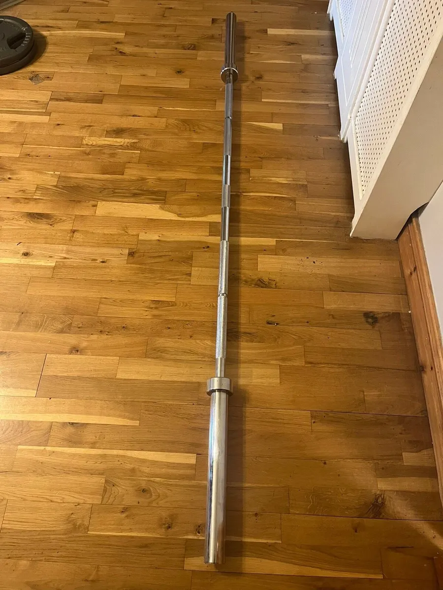 Squat rack ,Olympic barbell and 60 kg of plates - Image 1