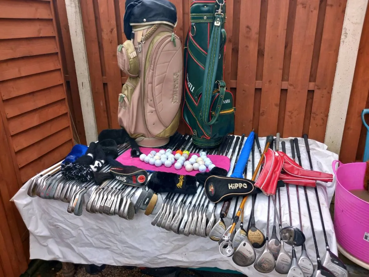 A selection of golf clubs and bags and golf balls - Image 1
