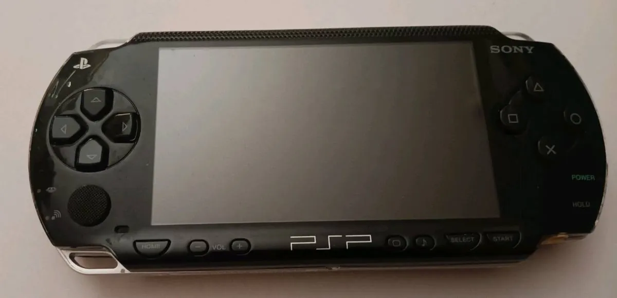 PSP Console, Games, Films and Accessories Bundle - Image 1