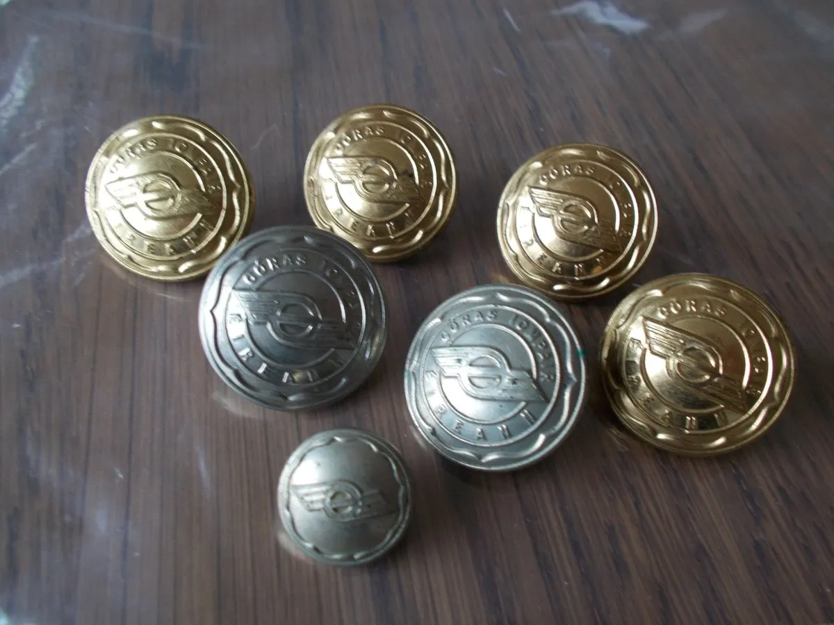 1950's C.I.E. Uniform Buttons Flying Snail - Image 1