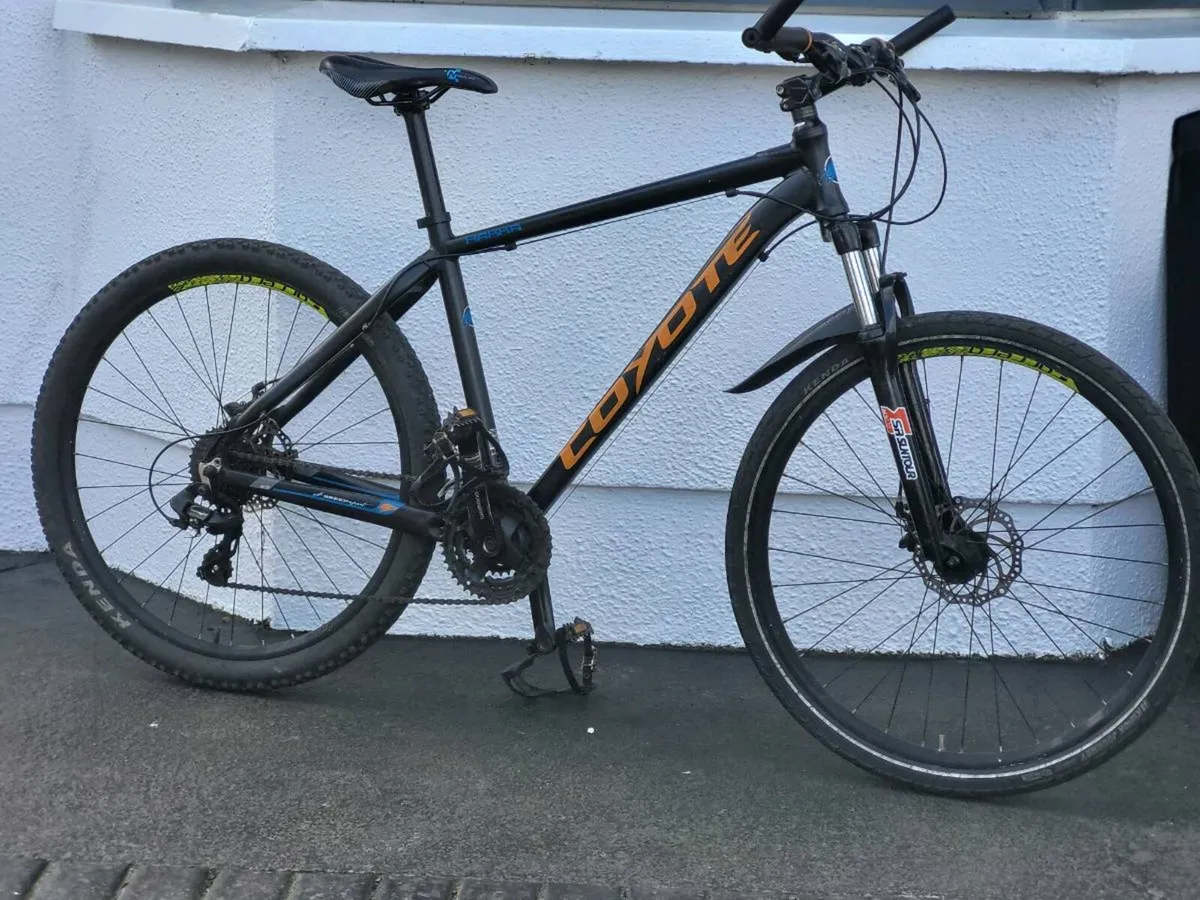 GUYS COYOTE DISC BRAKE BIKE - Image 1