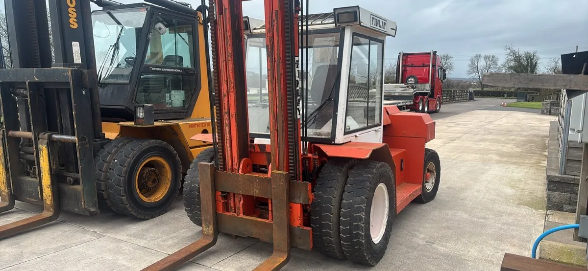 7 ton Finlay and 12 ton boss forklifts - Image 1