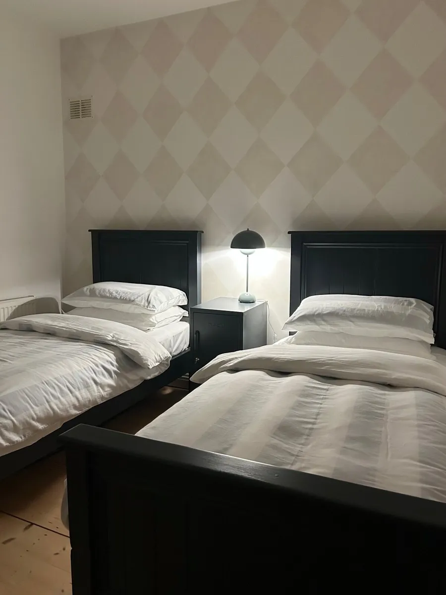 Two solid timber single beds - Image 2