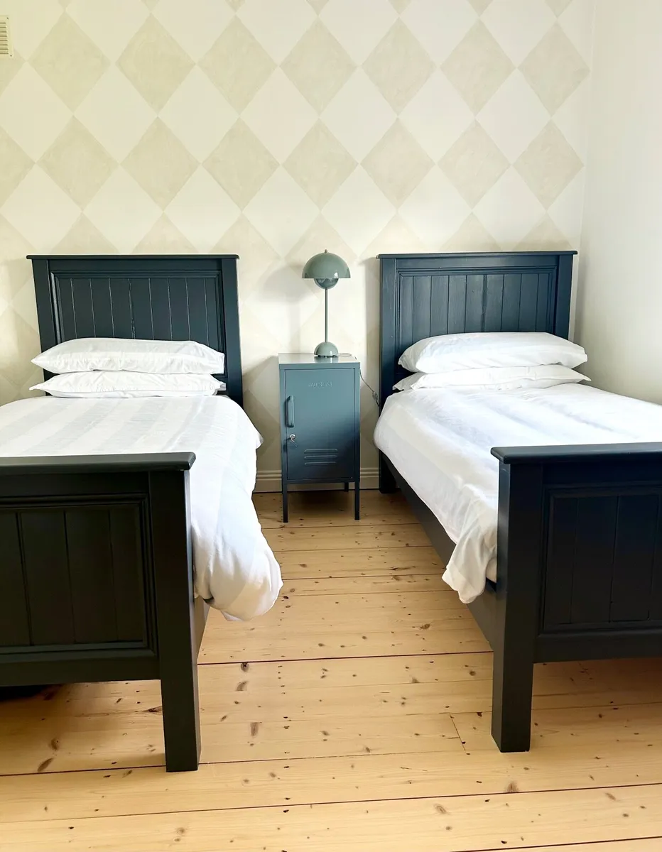 Two solid timber single beds - Image 1