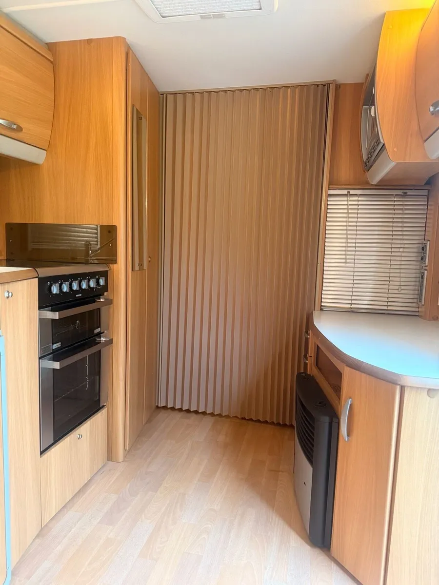 Swift Ace Caravan with Kampa 330 pro Awning - Image 1