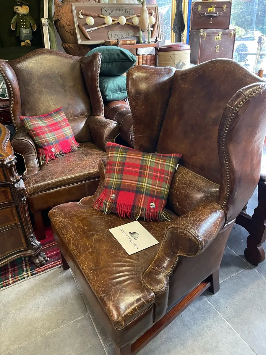 Matching pair leather wing chairs