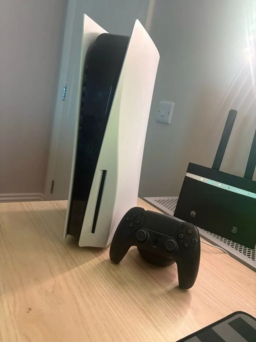 PlayStation 5 and racing steering wheel with TV for sale - Image 1