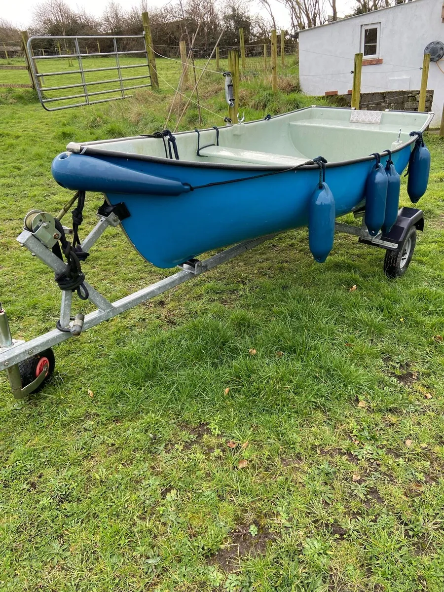 10 foot fiber glass tender on car trailer - Image 1