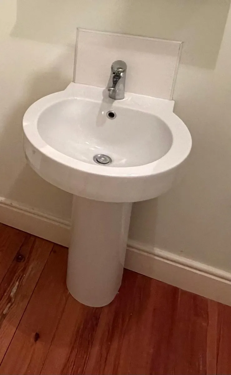 White porcelain sink and pedestal - Image 1