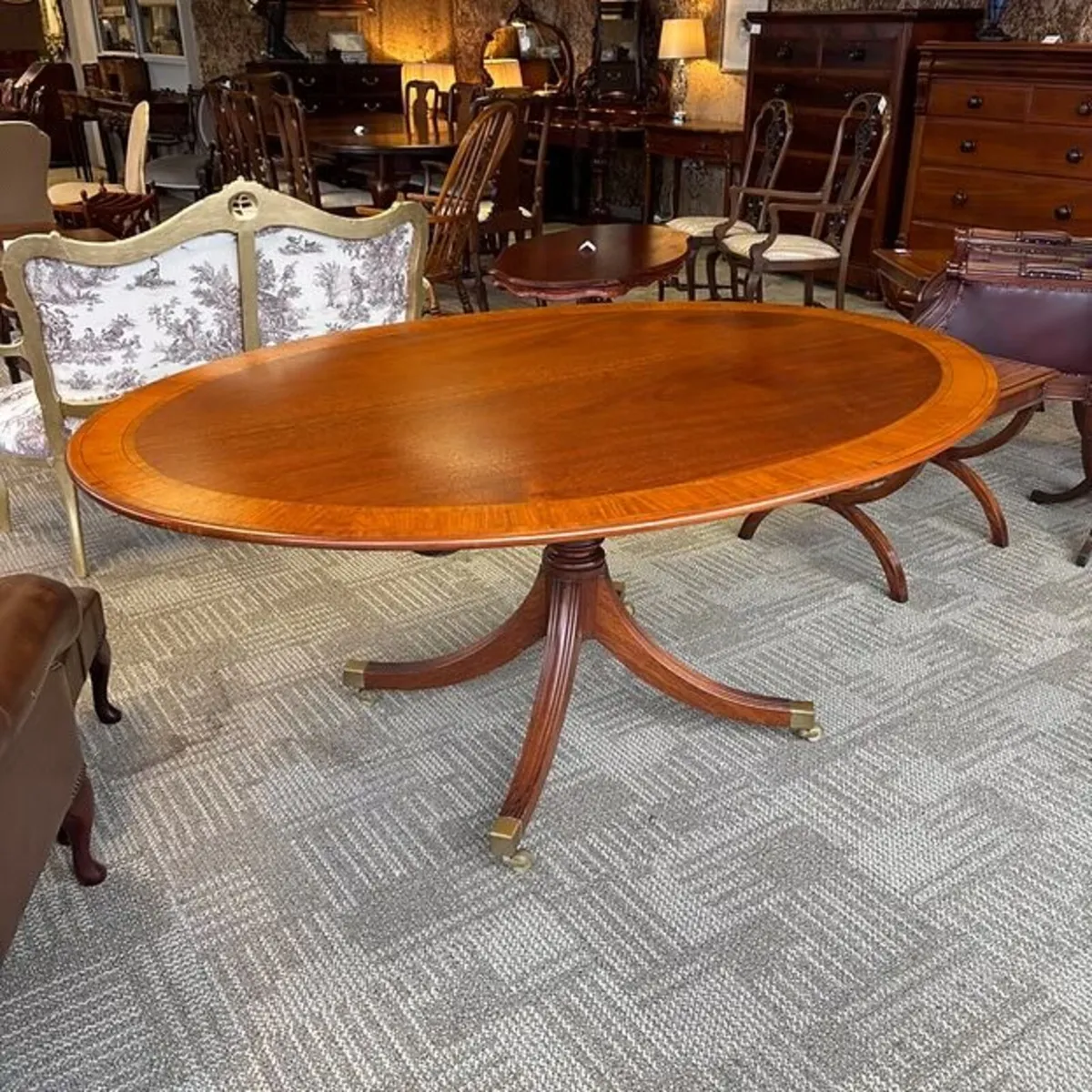 Fabulous oval mahogany inlaid dining table