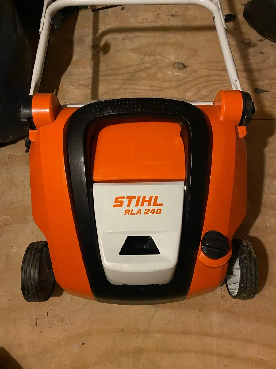 Stihl RLA 240 lawn scarifier battery and charger - Image 1
