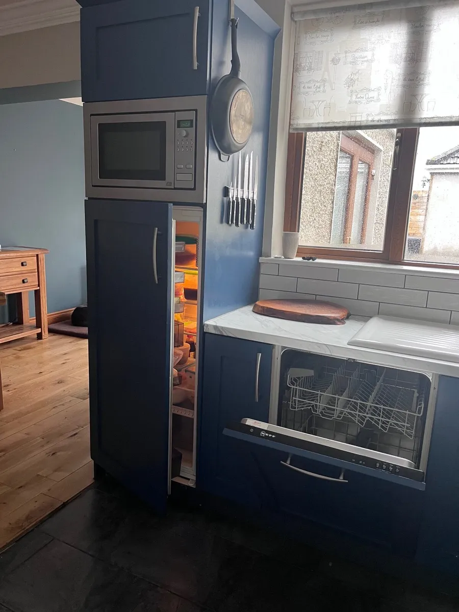 Utility cabinets and integrated dishwasher - Image 3