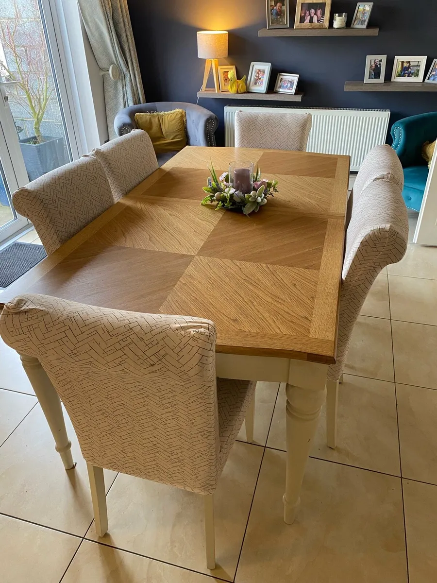 8 seater dining room table and 8 chairs