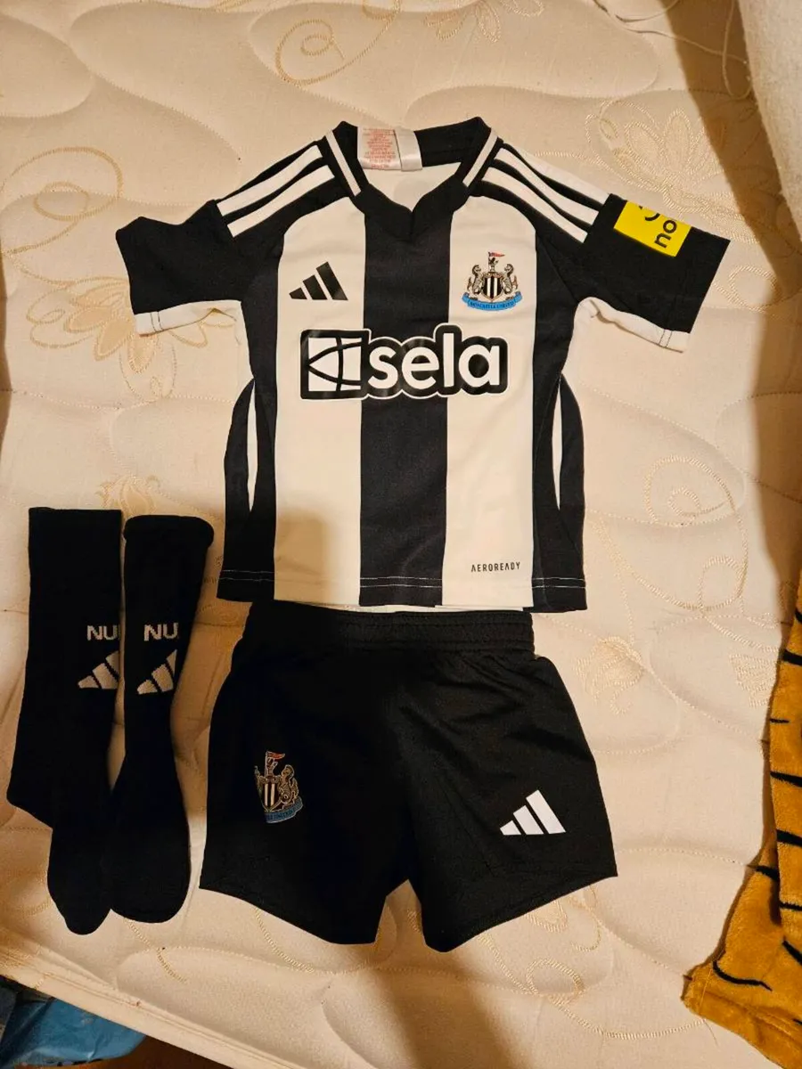 Newcastle united kit 12 to 24 month - Image 1