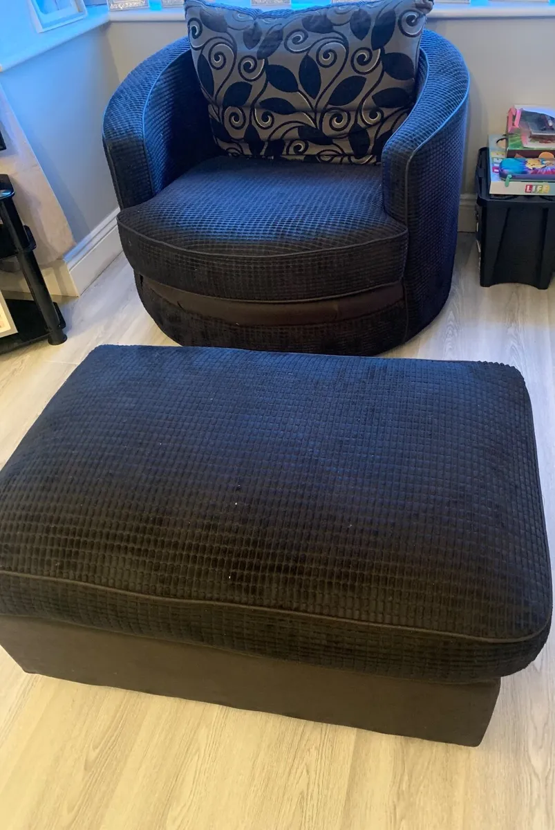Dark swivel chair and matching footstool - Image 1