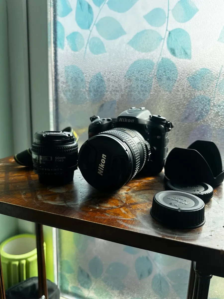 Nikon D7100 camera body with 24-85mm + 50mm lens - Image 1