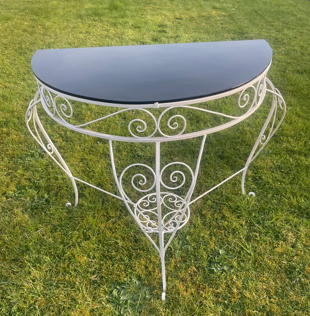 Vintage semicircular wrought iron table
