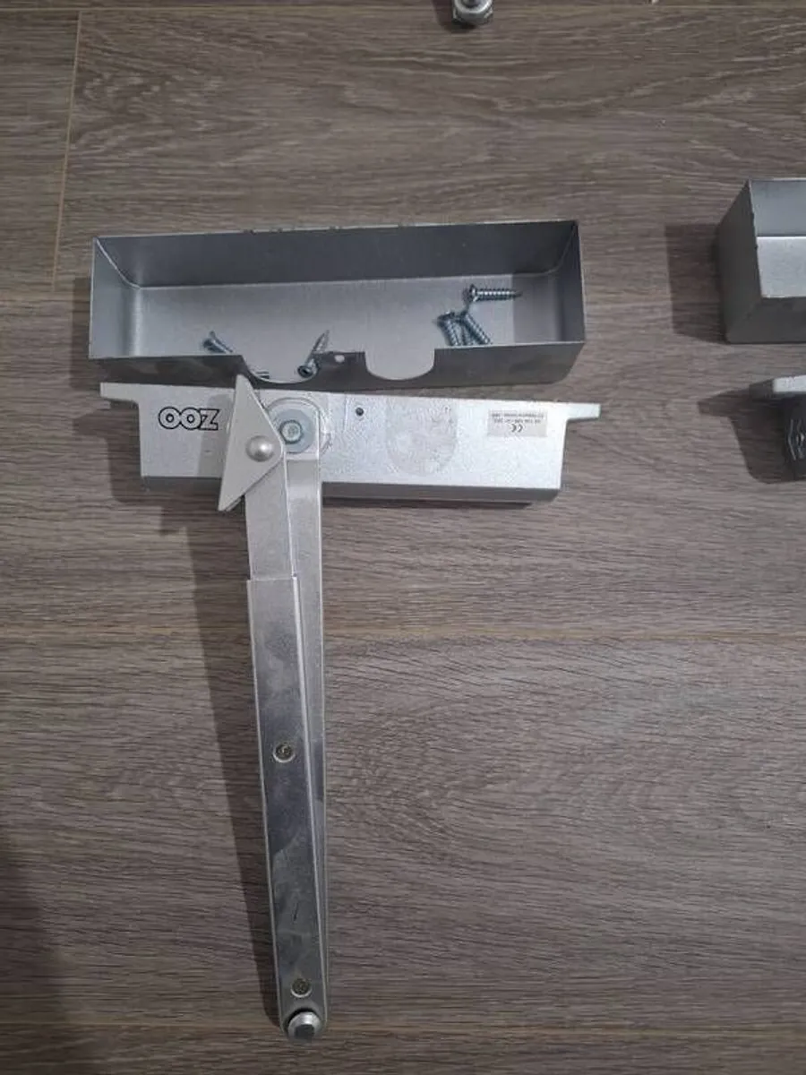8 x overhead door closer - Image 1