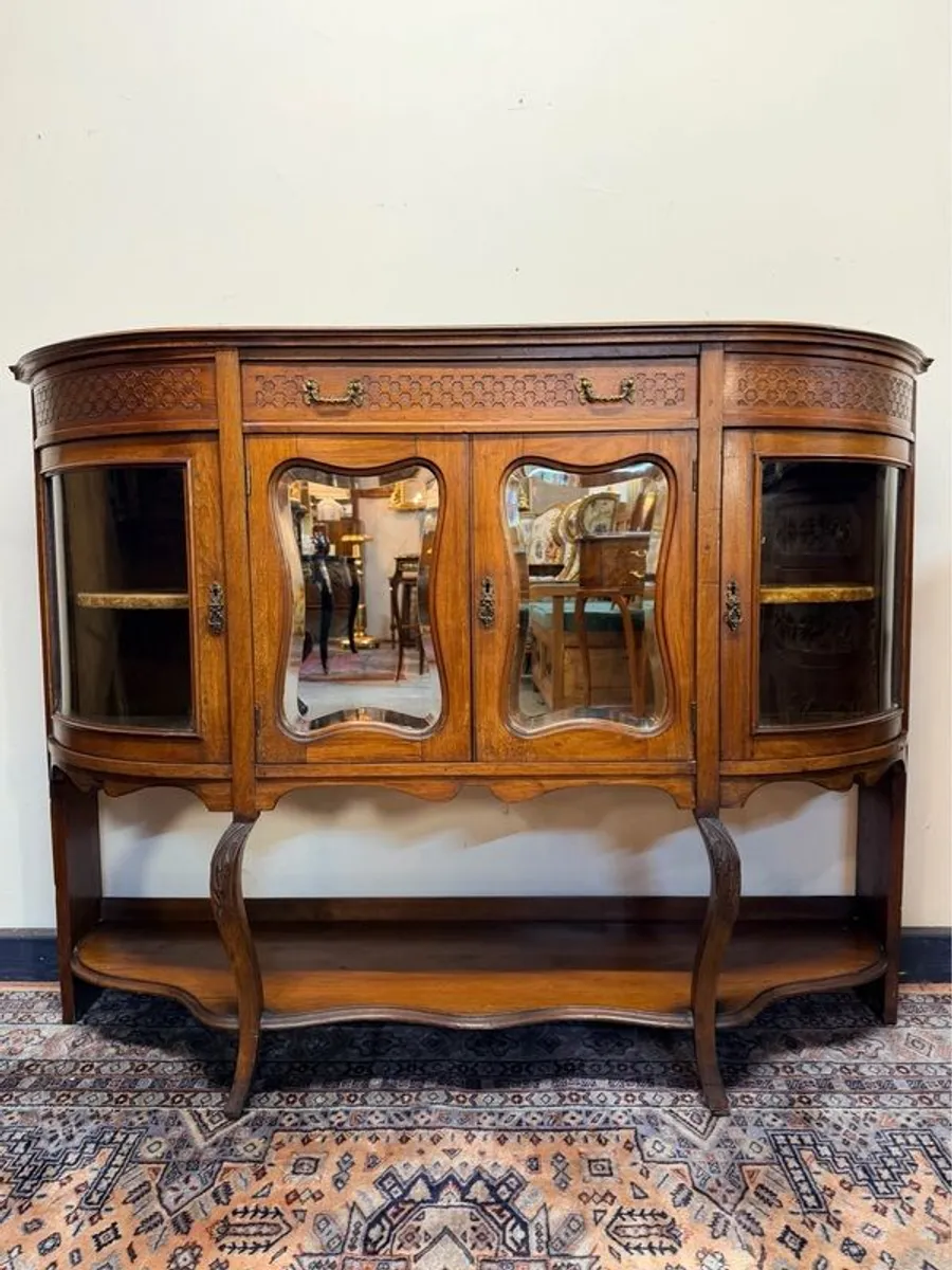 Early 20th Century Bow Front Walnut Display Cabinet with Beveled Glass Doors - Image 1