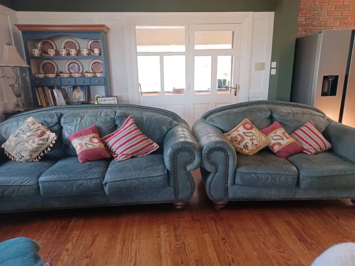 Green leather sofas - Image 1